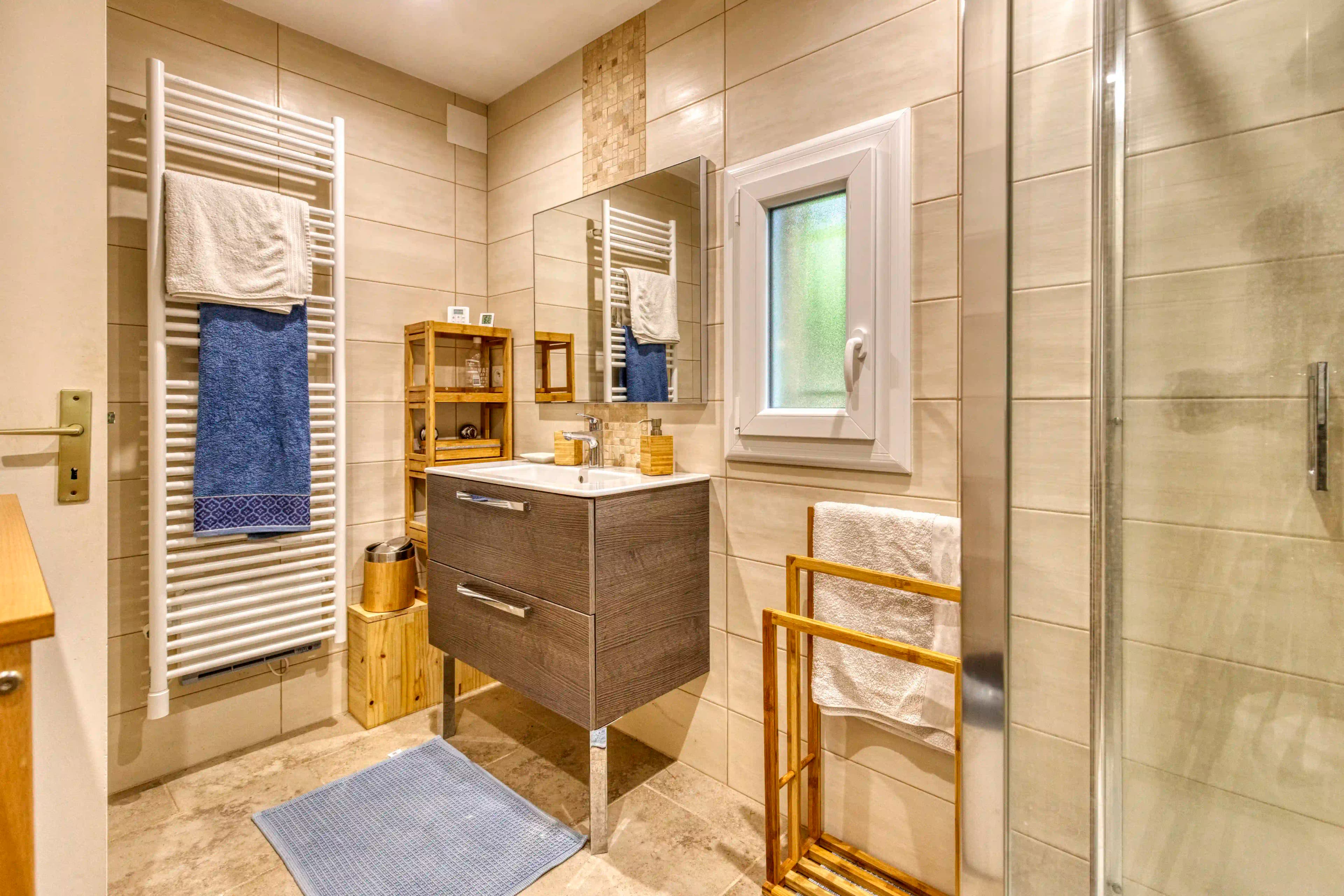Bathroom — Provençal tiles, golden fixtures