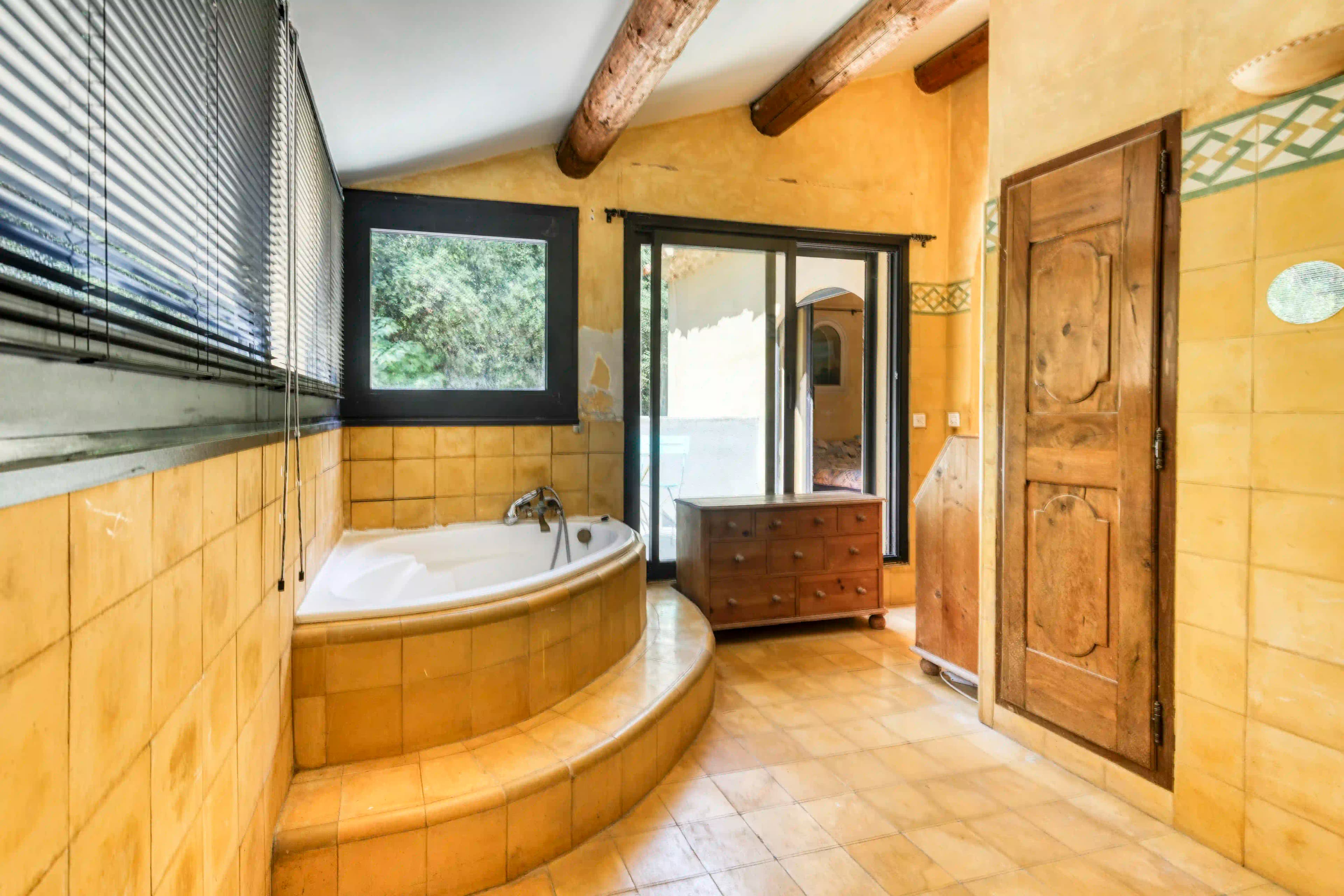 Bathroom — Whirlpool bath and exposed wooden beams