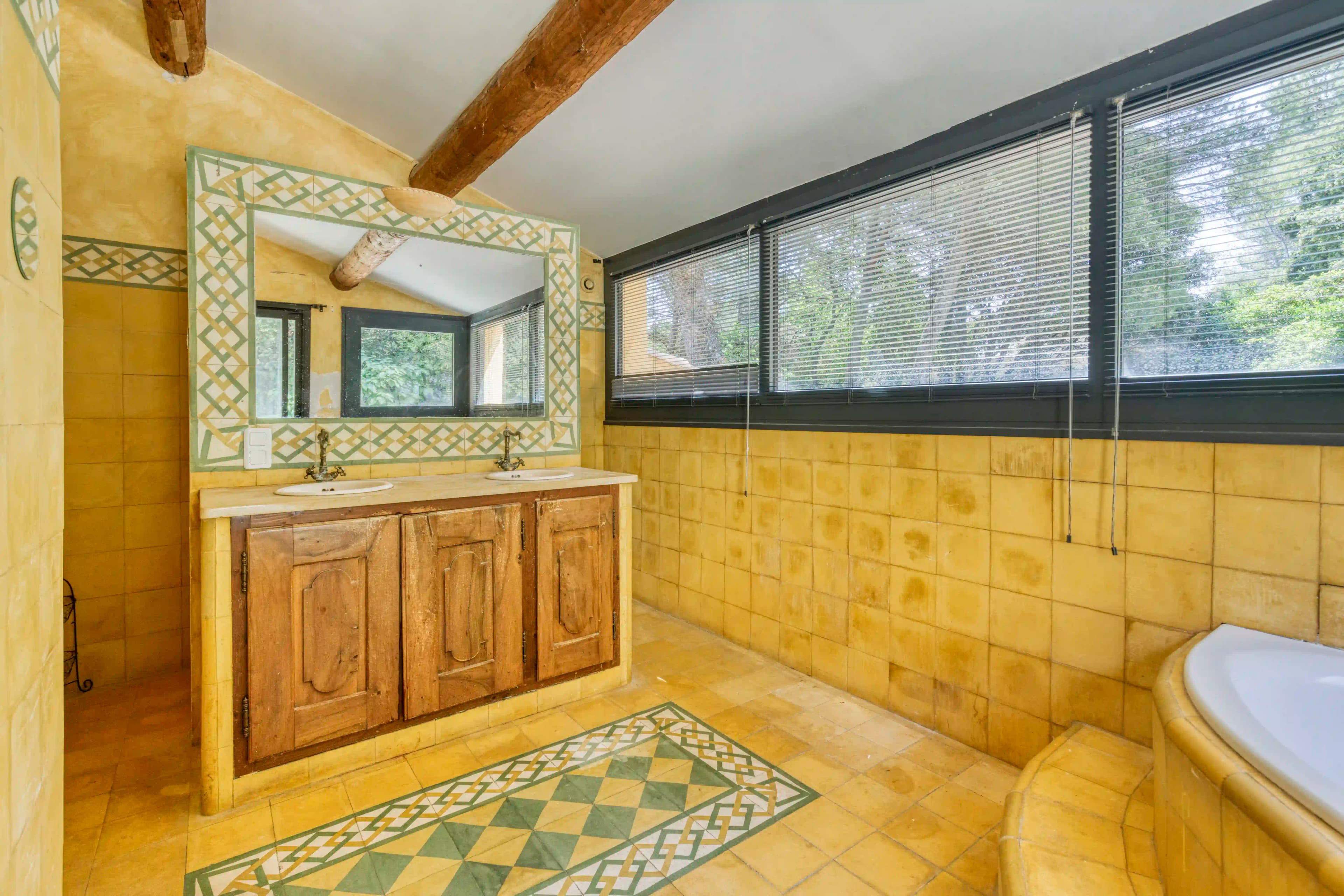 Bathroom — Bathtub and terracotta tiles, spa atmosphere